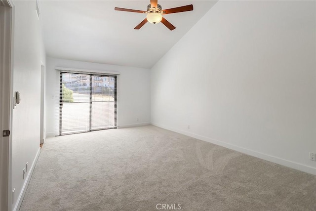 unfurnished room with light carpet, ceiling fan, and high vaulted ceiling