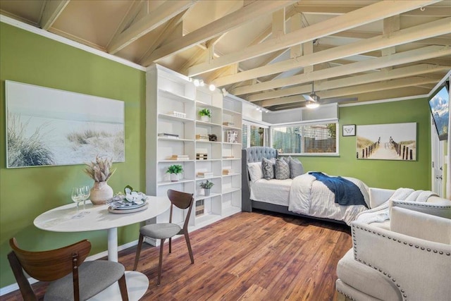 bedroom with hardwood / wood-style floors and lofted ceiling with beams