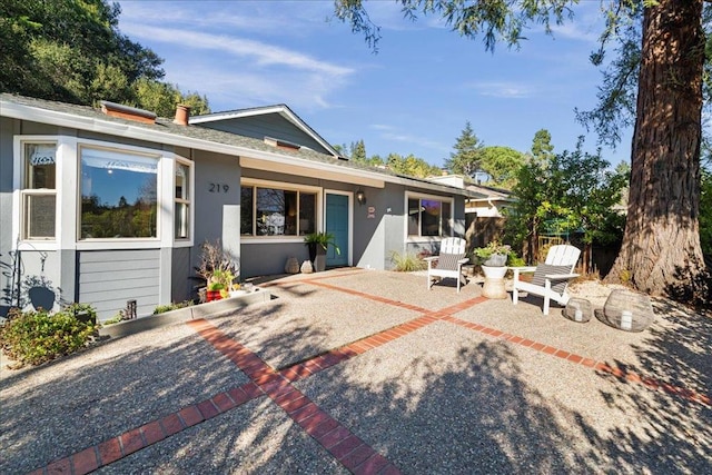 view of front of property with a patio area