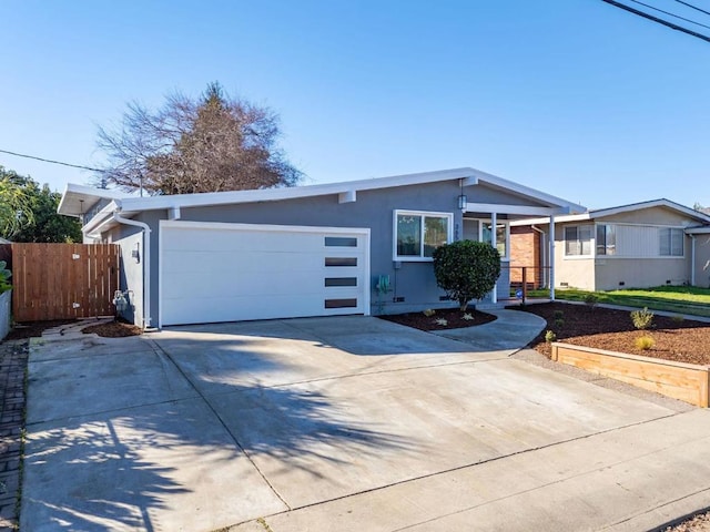 single story home featuring a garage