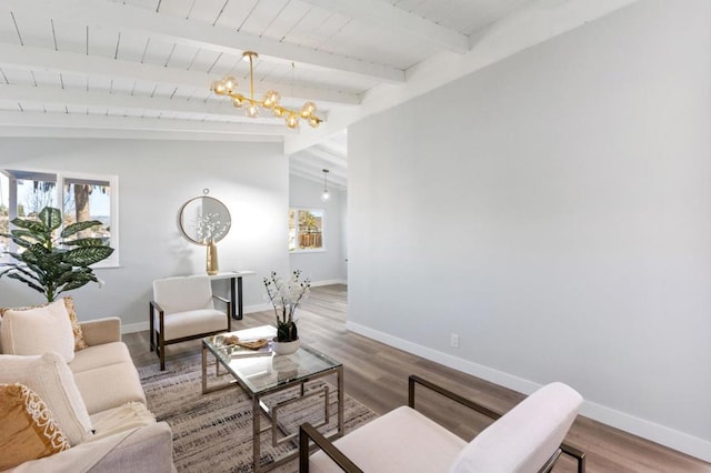 living room with wood ceiling, hardwood / wood-style flooring, lofted ceiling with beams, and a chandelier