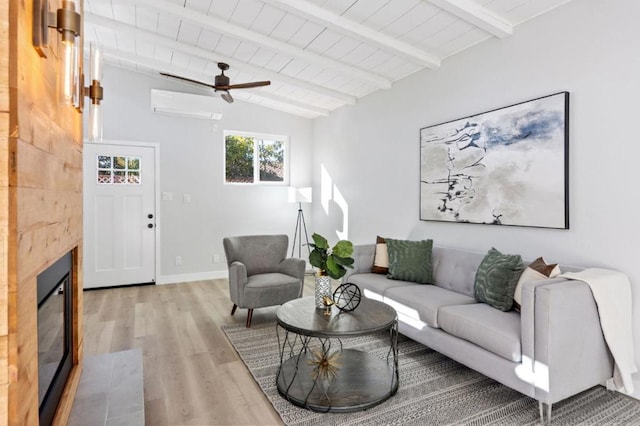 living room featuring a tile fireplace, a wall mounted air conditioner, lofted ceiling with beams, wood ceiling, and light hardwood / wood-style flooring