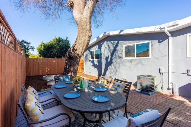 view of patio with central AC unit