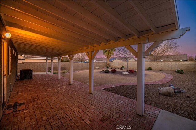 patio terrace at dusk with cooling unit