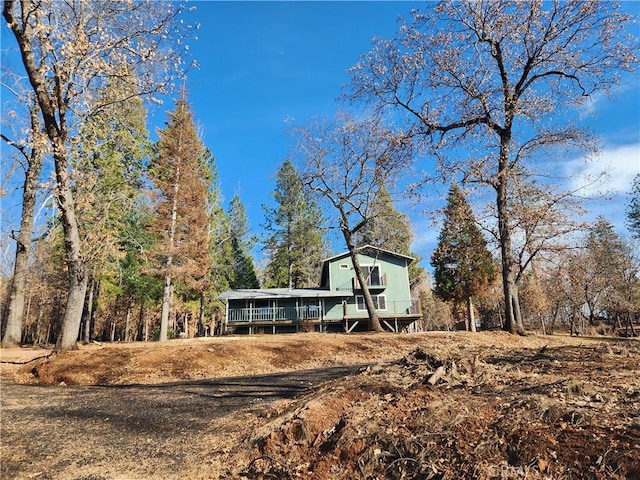 view of front of property featuring a sunroom