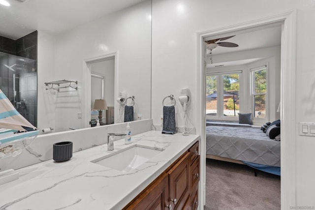 bathroom featuring ceiling fan and vanity