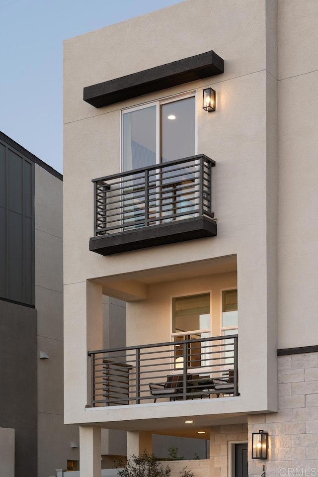 14679 Dunleer Way, San Diego, CA 92126 - back of house featuring a balcony and stucco siding