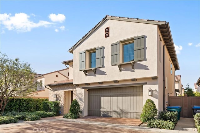 view of front of property featuring a garage