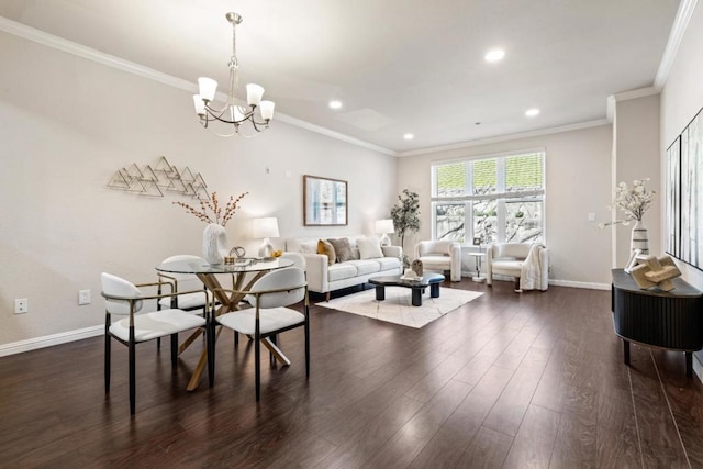 dining room with dark hardwood / wood-style floors, crown molding, and a notable chandelier