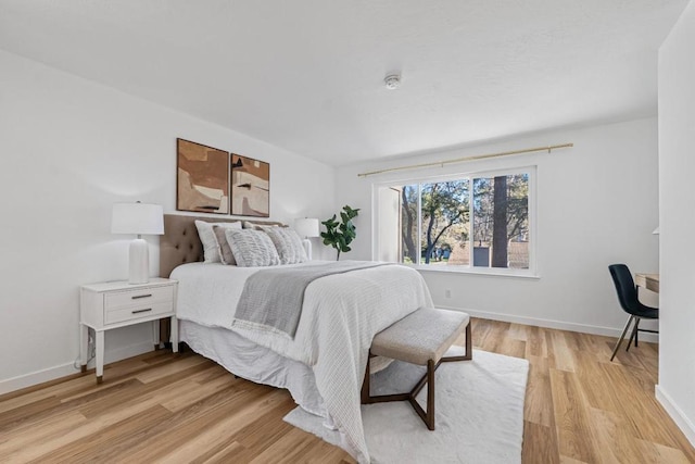 bedroom featuring light wood-type flooring