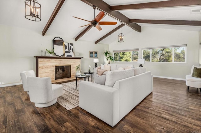 living room featuring vaulted ceiling with beams, dark hardwood / wood-style floors, and ceiling fan