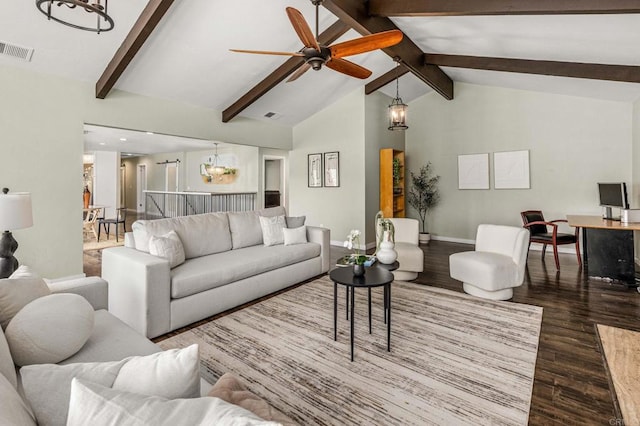 living room featuring hardwood / wood-style flooring, ceiling fan with notable chandelier, high vaulted ceiling, and beamed ceiling