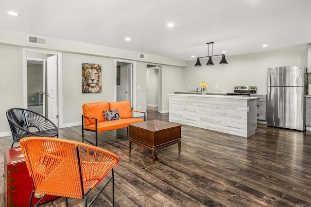 2846 Willow Glen Dr, El Cajon, CA 92019 - living room featuring dark wood-style floors, baseboards, and recessed lighting