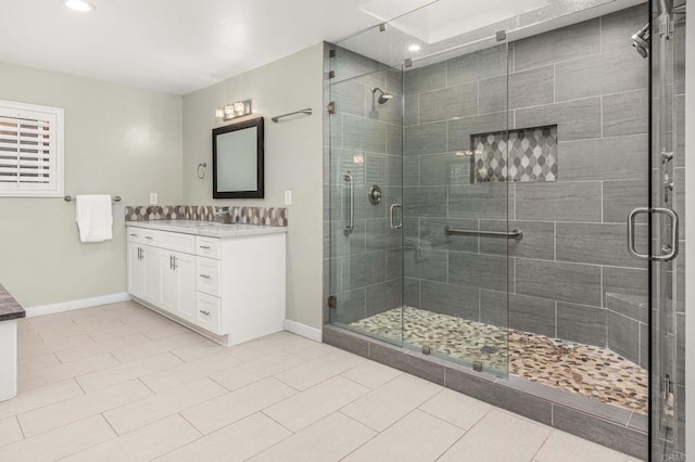 2846 Willow Glen Dr, El Cajon, CA 92019 - full bathroom featuring vanity, a stall shower, baseboards, and recessed lighting