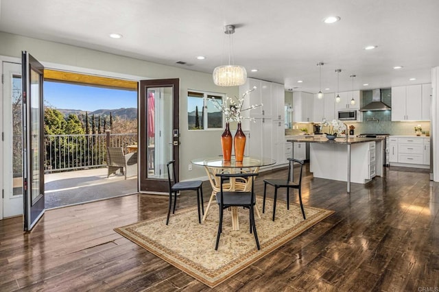 2846 Willow Glen Dr, El Cajon, CA 92019 - dining space featuring recessed lighting, dark wood-style floors, a chandelier, a mountain view, and baseboards