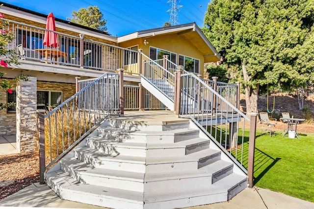 2846 Willow Glen Dr, El Cajon, CA 92019 - view of front facade featuring stairway, a front yard, and stucco siding