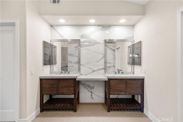 bathroom featuring tile patterned floors and vanity