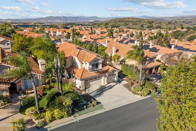 drone / aerial view featuring a mountain view