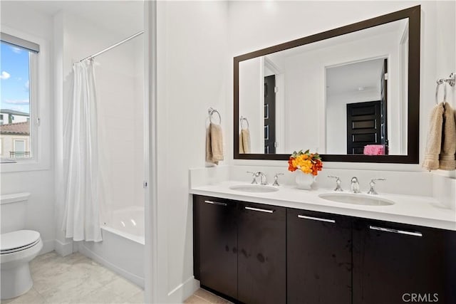 full bathroom with toilet, vanity, and shower / bathtub combination with curtain