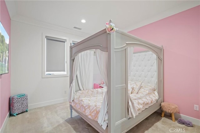 bedroom with light colored carpet and ornamental molding