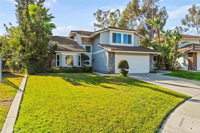 view of front of house with a garage and a front yard