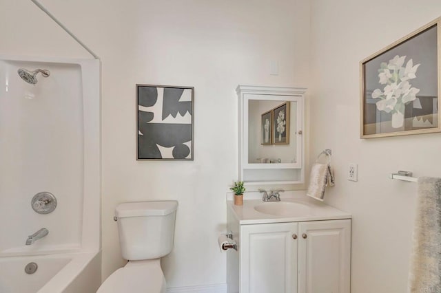 full bathroom featuring toilet, bathing tub / shower combination, and vanity