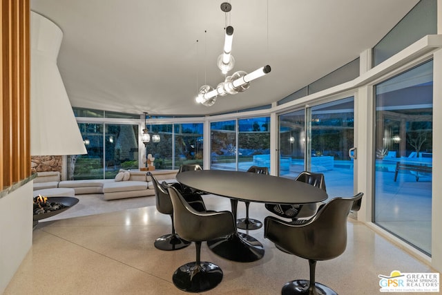 dining area featuring expansive windows