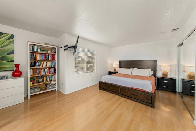 bedroom featuring hardwood / wood-style floors