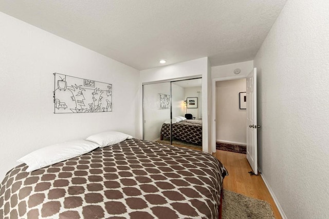 541 Camino Del Mar, Del Mar, CA 92014 - bedroom with a closet, baseboards, and wood finished floors