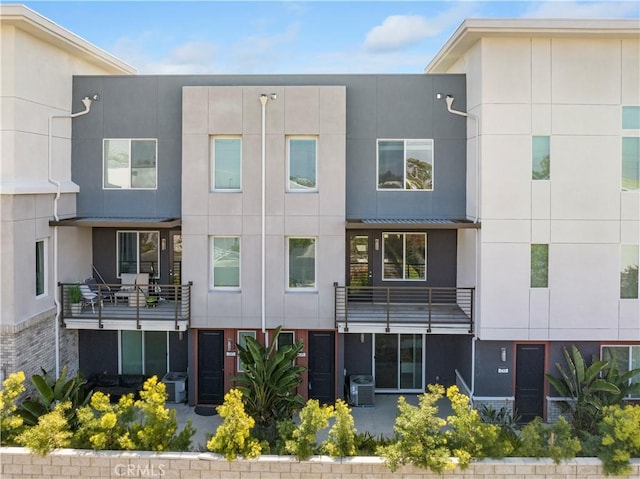 view of building exterior featuring central AC unit