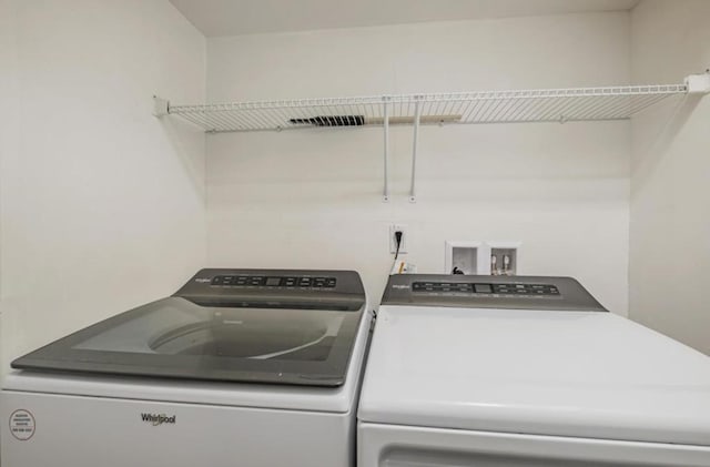 laundry area with washer and dryer