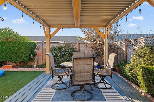 wooden deck with a yard