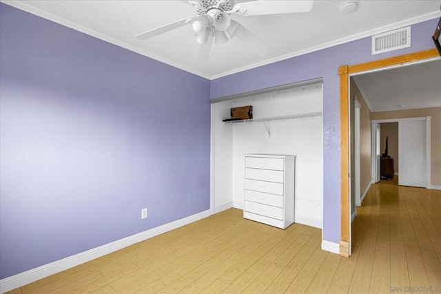 unfurnished bedroom with ceiling fan, light hardwood / wood-style flooring, and ornamental molding