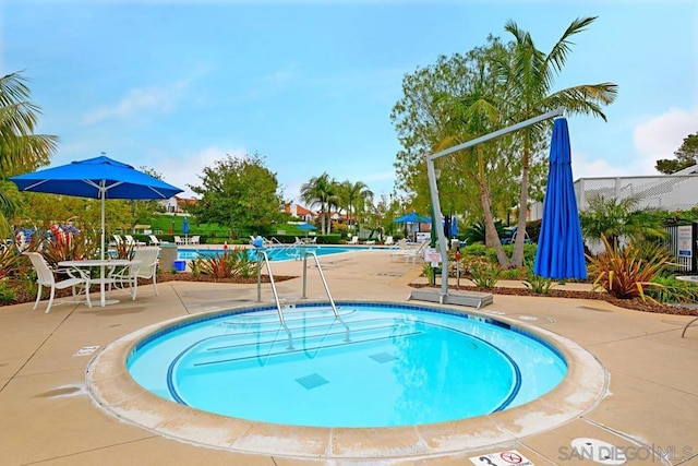 view of pool with a patio area