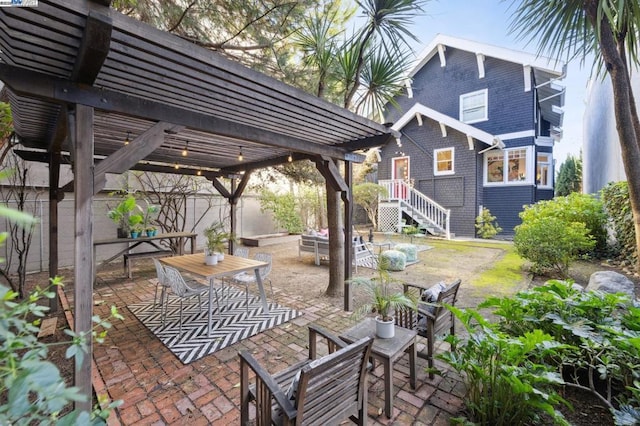 view of patio / terrace with an outdoor hangout area and a pergola