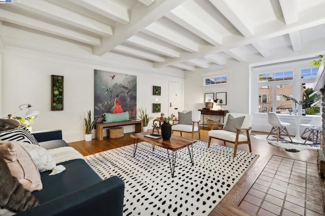 living room featuring hardwood / wood-style floors and beam ceiling