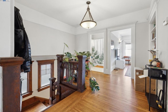 corridor featuring light hardwood / wood-style floors