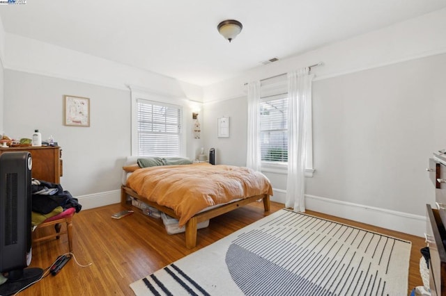 bedroom with light wood-type flooring