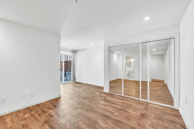 interior space with hardwood / wood-style floors