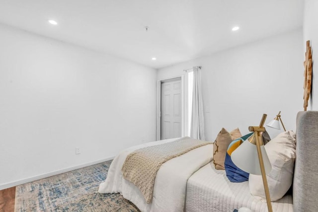 bedroom featuring hardwood / wood-style flooring