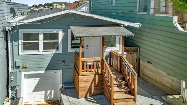 doorway to property featuring a garage