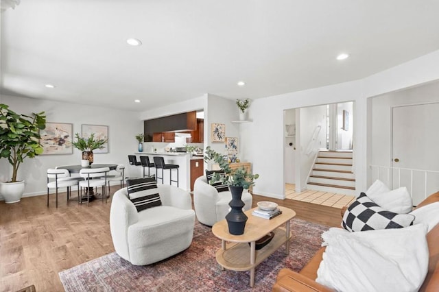 living room with light hardwood / wood-style flooring