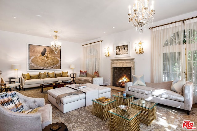 living room featuring a notable chandelier