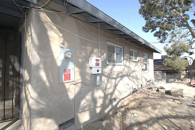 view of property exterior with a patio