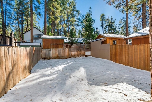 view of yard covered in snow