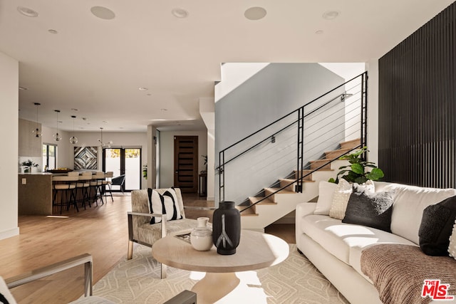 living room with light hardwood / wood-style flooring