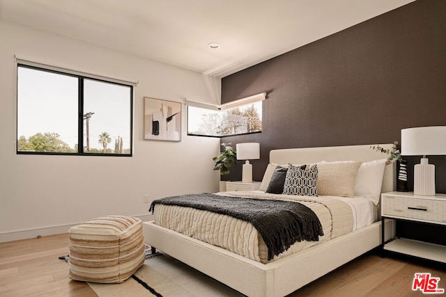 bedroom featuring light wood-type flooring