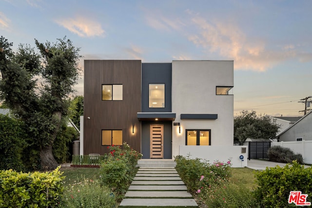 contemporary house with a yard