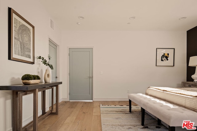 bedroom with light wood-type flooring