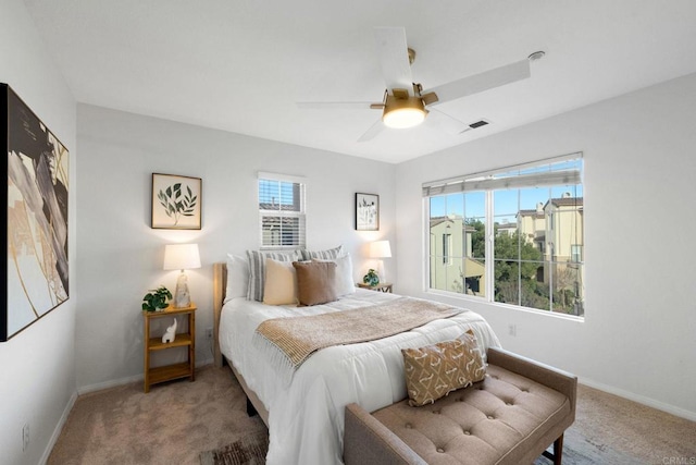 bedroom featuring ceiling fan and carpet flooring